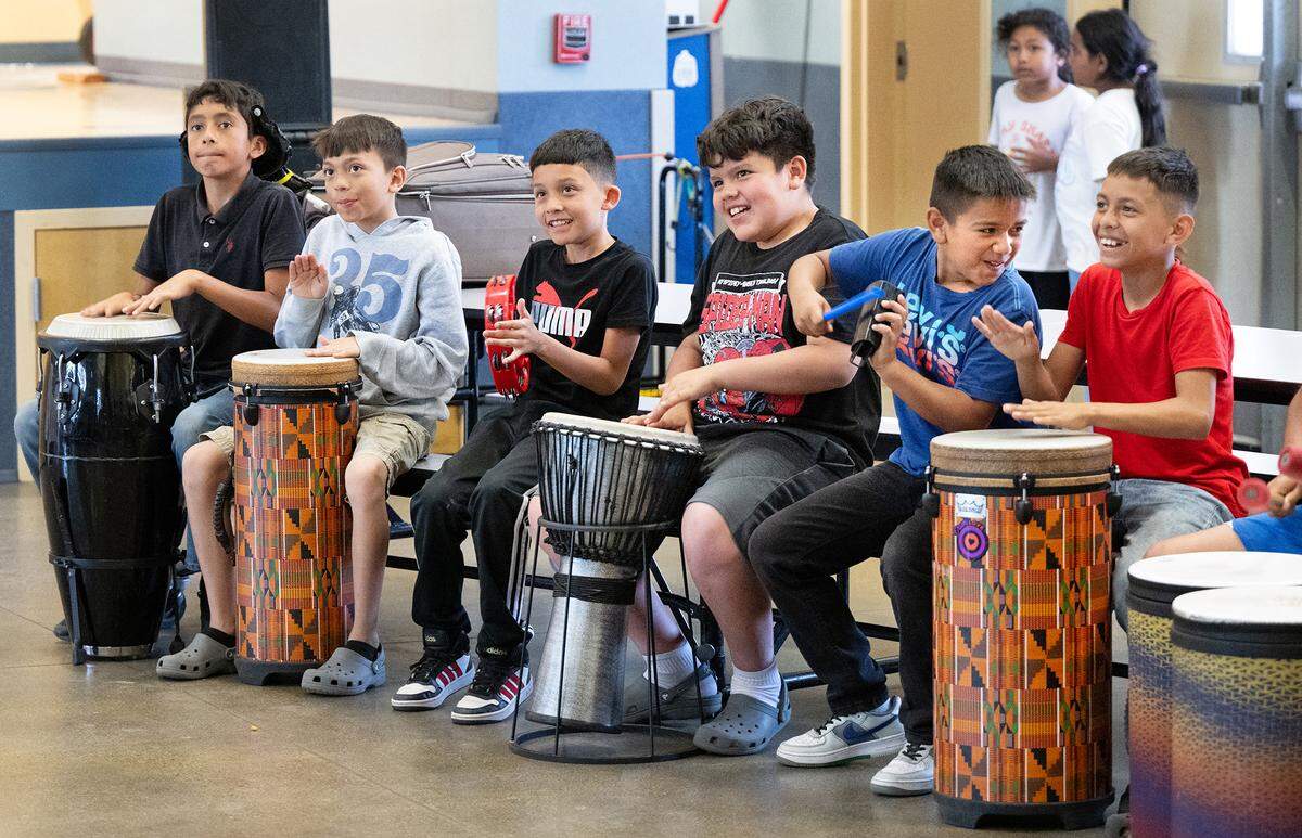 Students play percussion instruments during an arts after-school program at Bret Harte Elementary School in Modesto, Calif., Wednesday, May 22, 2024.