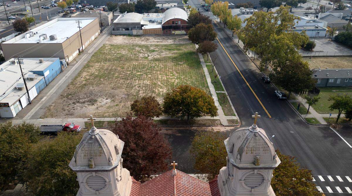 The vacant lot is the future site of Seventh Street Village on Seventh and J streets and the former Salvation Army center is at top right.