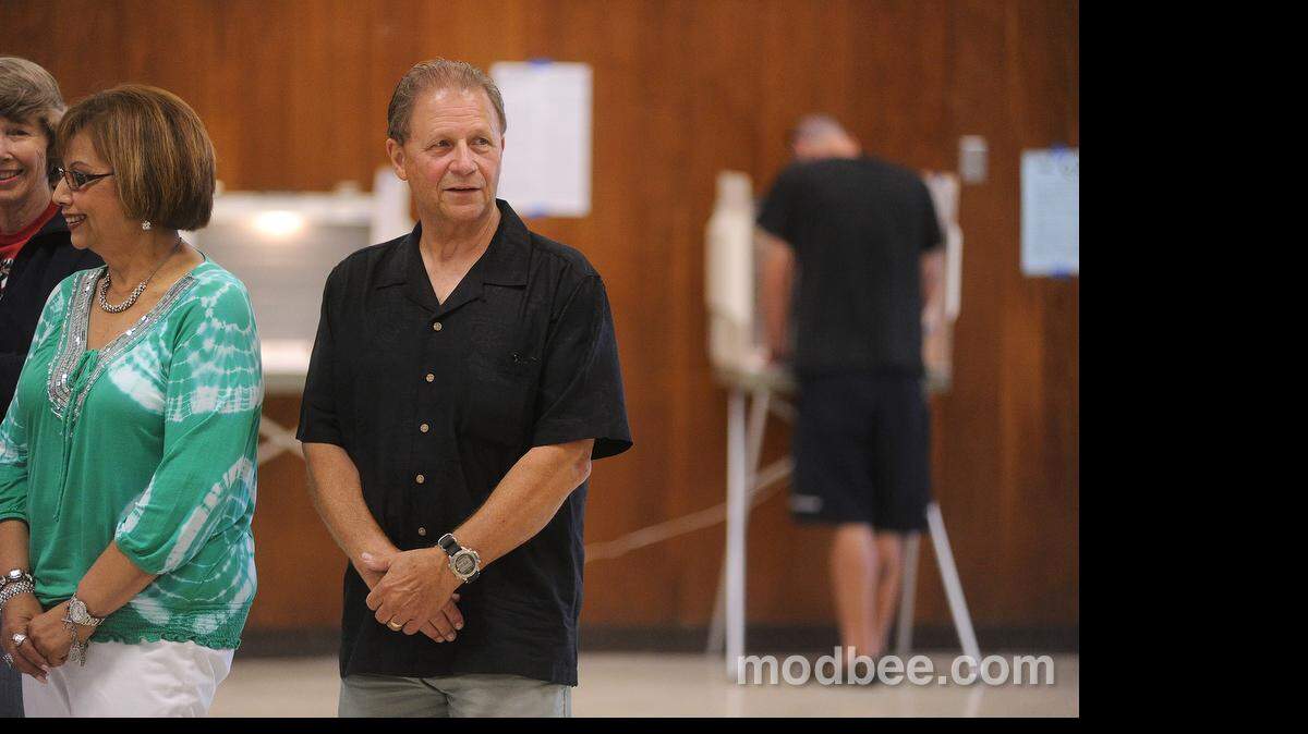 Elias Funez/efunez@modbee.com
Riverbank special election candidate Cal Campbell quietly watches as voters cast their ballots and as city employees ready to hand count them Tuesday evening (06-04-13) at the Riverbank Community Center where the special election is conducted.
