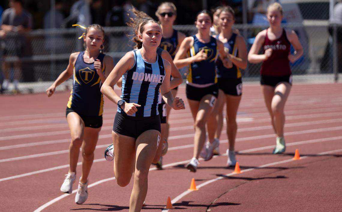 Downey’s Zoe Leach won the 3200 meter race with a time of 11:08.82 during the Central California Athletic League track and field championships at Turlock High School in Turlock, Friday, May 2, 2025.