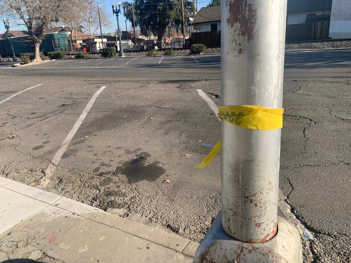 Crime scene tape remained at the scene of a shooting that left seven people injured on South First Street in Turlock, Calif. early Saturday Feb. 19, 2022