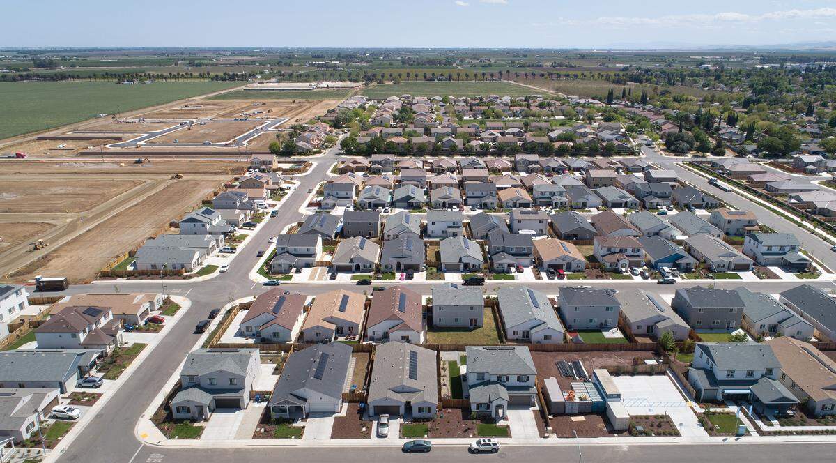 New housing development by KHovanian Homes are part of the Villages of Patterson in northeast part of town. Photographed in Patterson, Calif., on Tuesday, April 12, 2022.