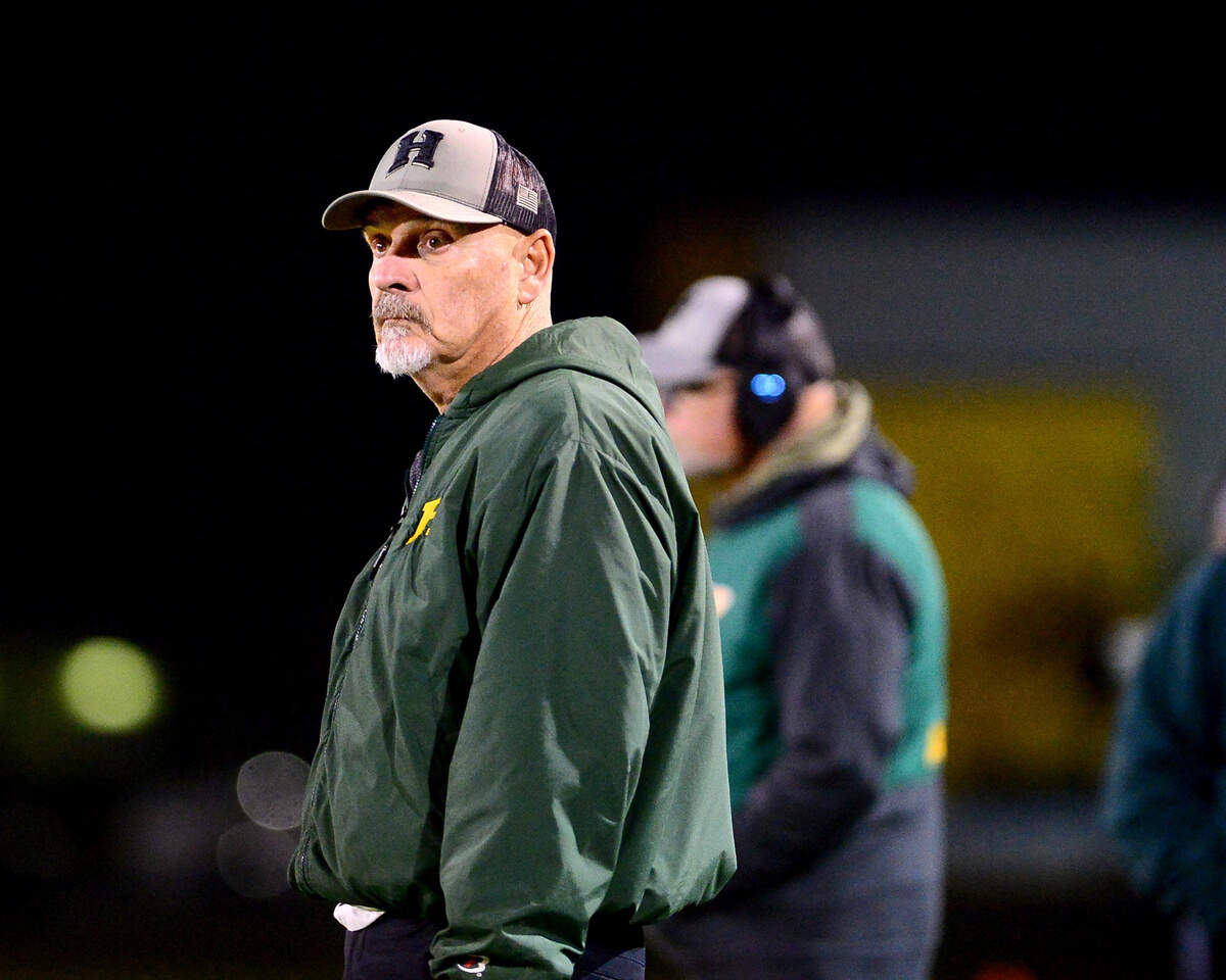 Hilmar Head Coach Frank Marques watches from the sideline during a Sac-Joaquin Division 5 Playoff game with Sutter at Hilmar High School in Hilmar, Nov. 21, 2025.