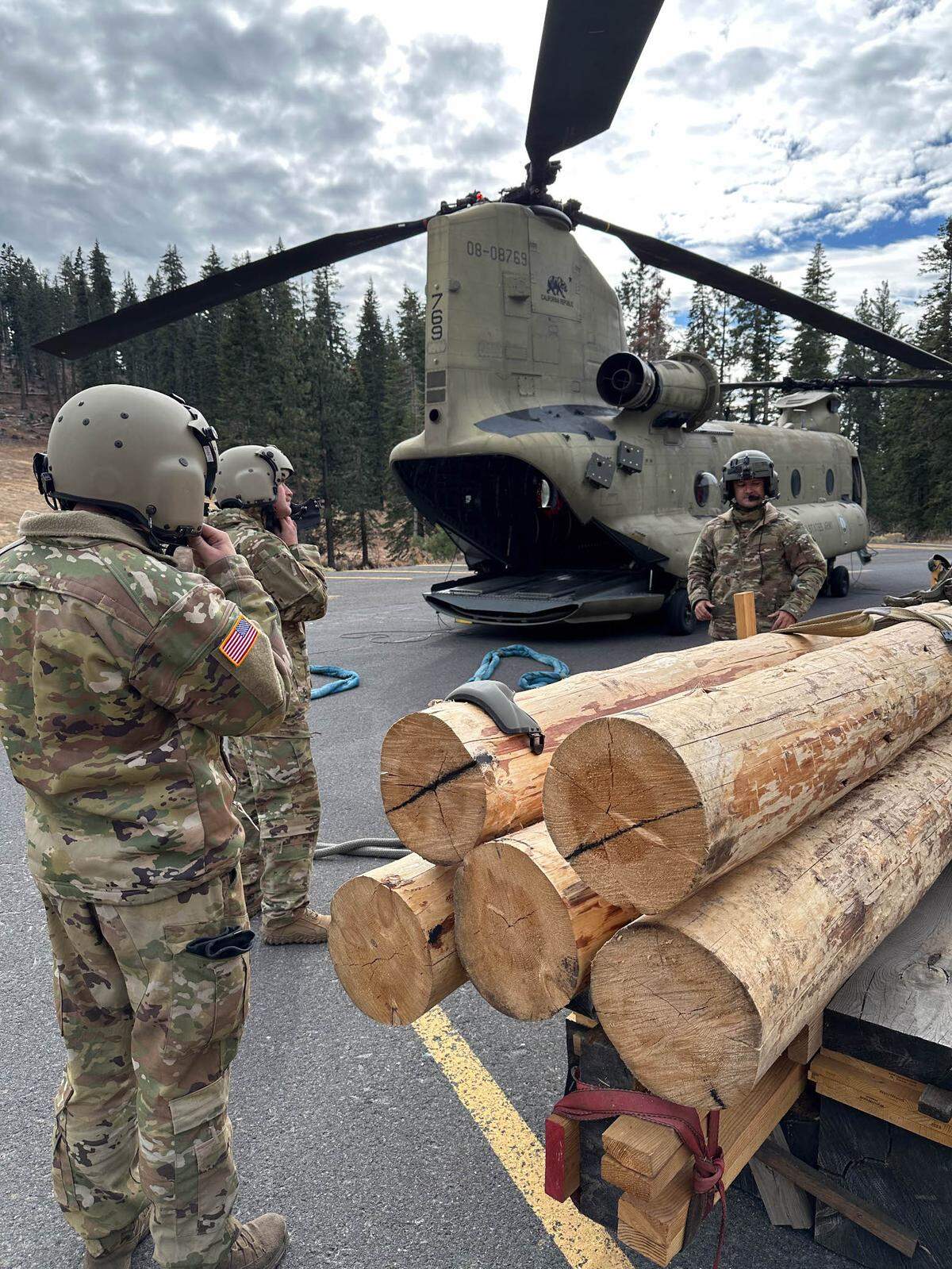 A California National Guard CH-47 Chinook helicopter used to deliver critical supplies used to conserve a cultural site in the wilderness is staged in the Stanislaus National Forest prior to takeoff, Oct. 30, 2024. There are over 800 wilderness areas in the United States, managed by different land agencies, to include the National Parks, Bureau of Land Management, U.S. Fish and Wildlife Service and the Forest Service. (Courtesy photo)