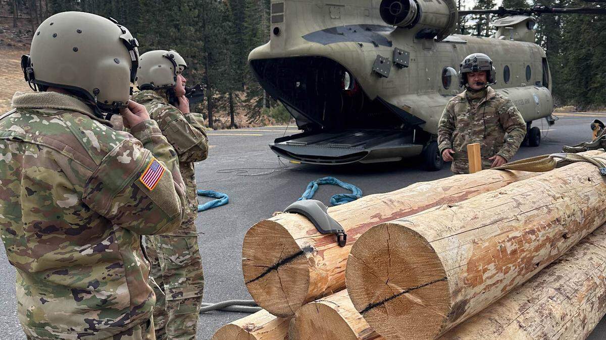 A California National Guard CH-47 Chinook helicopter used to deliver critical supplies used to conserve a cultural site in the wilderness is staged in the Stanislaus National Forest prior to takeoff, Oct. 30, 2024. There are over 800 wilderness areas in the United States, managed by different land agencies, to include the National Parks, Bureau of Land Management, U.S. Fish and Wildlife Service and the Forest Service. (Courtesy photo)