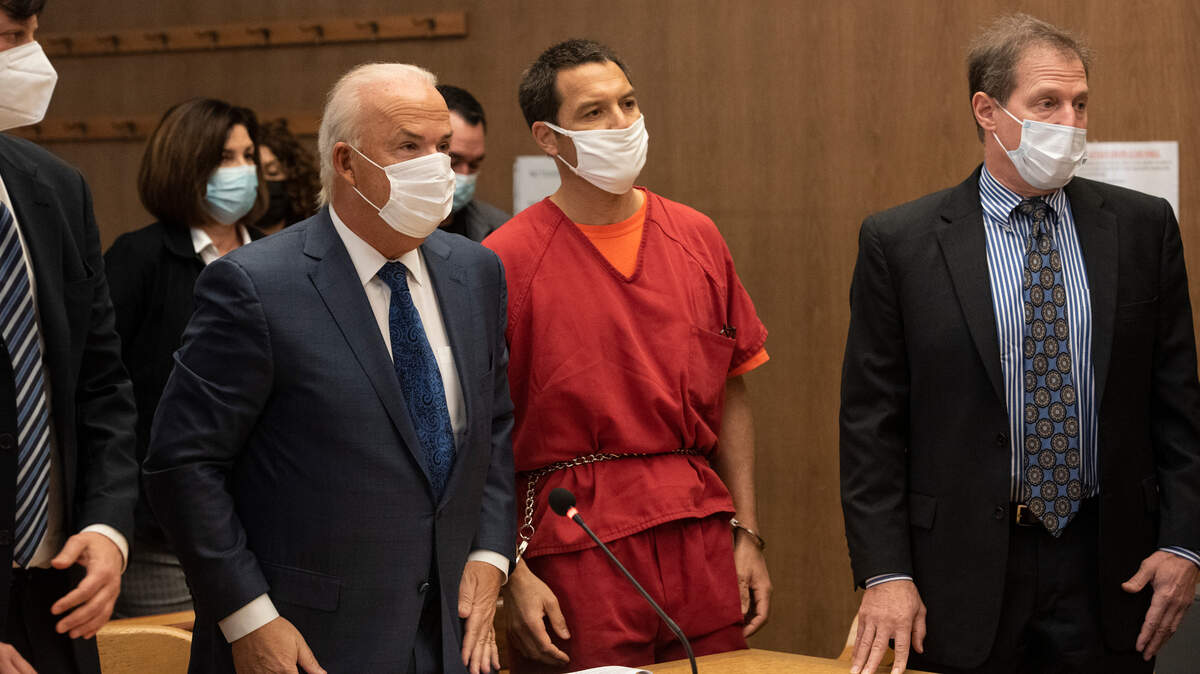Scott Peterson and his council stand as the Judge Anne-Christine Massullo enters the room during a resentencing hearing at the San Mateo County Superior Court in Redwood City, Calif., Dec. 8, 2021. Peterson appeared in San Mateo Superior Court for the first time since he was sentenced to death there more than 17 years ago for the murders of his wife Laci and their unborn son Conner. (POOL-Andy Alfaro,The Modesto Bee)