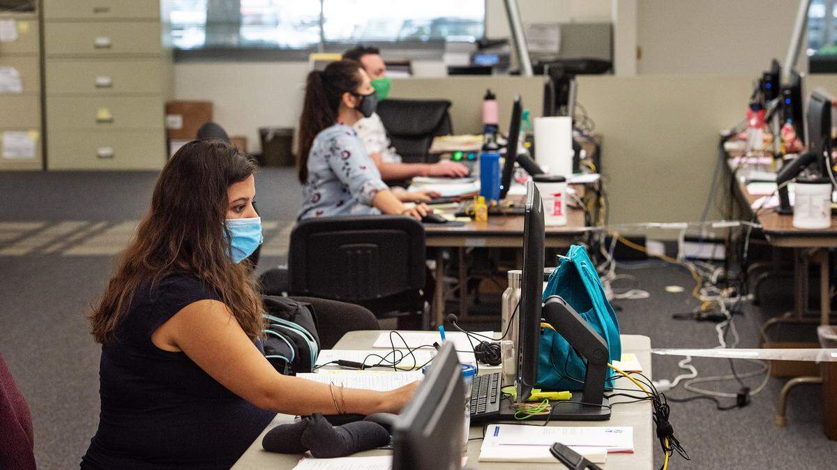 Coronavirus case investigator Jesenia Moreno-Leal works at the Stanislaus County Emergency Operations Center in Modesto, Calif., on Tuesday, July 21, 2020.