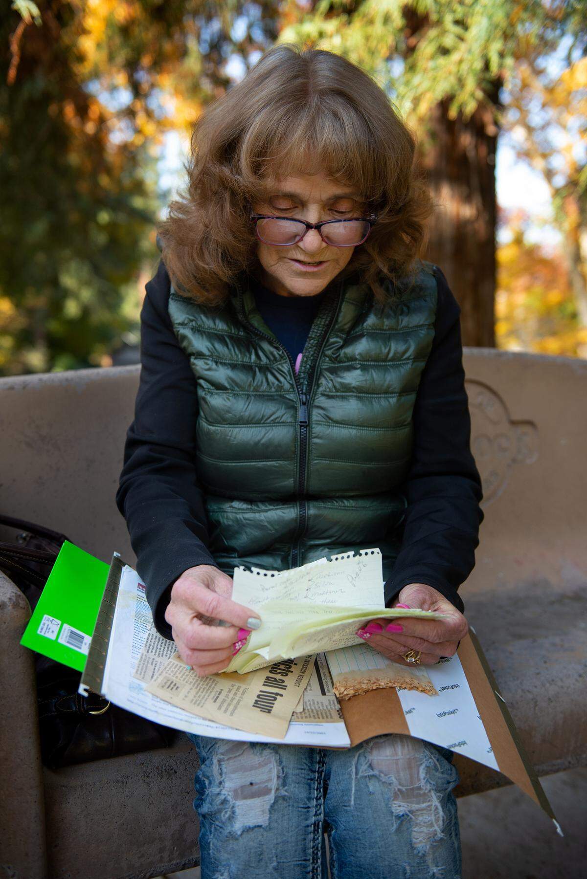 Renae Frye talks with the Bee about her experience being a victim of a home invasion in 2003. Frye took notes and kept newspaper clipping from the trial of the group responsible for the home invasion spree. Photographed Wednesday, Nov. 23, 2022.