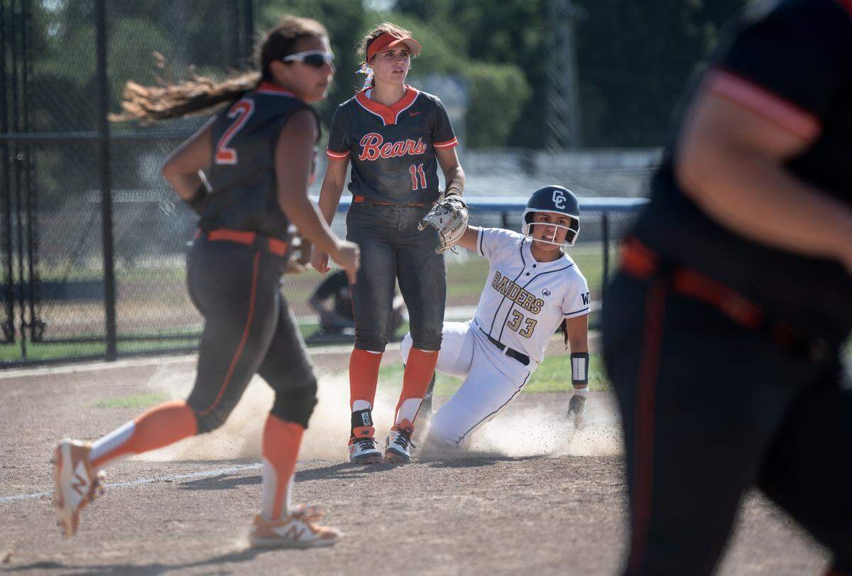Central Catholic’s Sarah Soto (33) slides safely into third on a ground ball during the CIF Sac-Joaquin Section Division III softball playoffs at Central Catholic High School in Modesto, Calif., on Thursday, May 19, 2022.