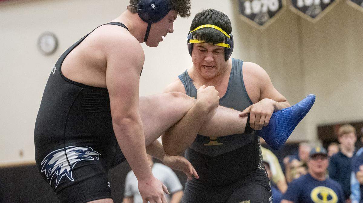 Turlock’s Michael Jeffus, right, and Vista Del Lago’s Justin Ramos wrestle at the 285lb. championship match during the CIF Sac-Joaquin Section Masters Wrestling meet at Delta College in Stockton, Calif., Saturday, Feb. 16, 2019.