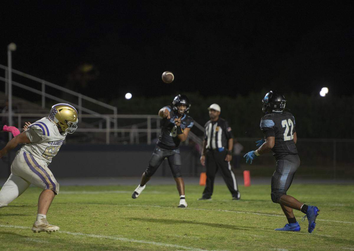 El Capitan quarterback Sergio Mendoza delivers a pass during the first half of Friday’s CIF Sac-Joaquin Section Bowl against Livingston at Stadium 76. Mendoza helped lead the Gauchos to a 22-8 victory in their first November game in program history.