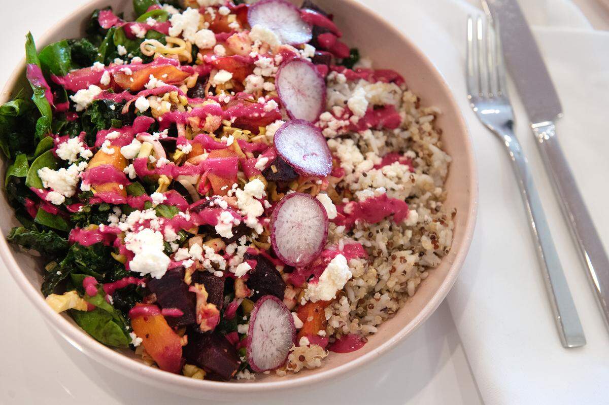 Grain bowl, (grain medley, spinach, roasted vegetables, pickled radish, and feta cheese) served at Relish eatery on Main Street in Escalon, Calif., Tuesday, March 21, 2023.