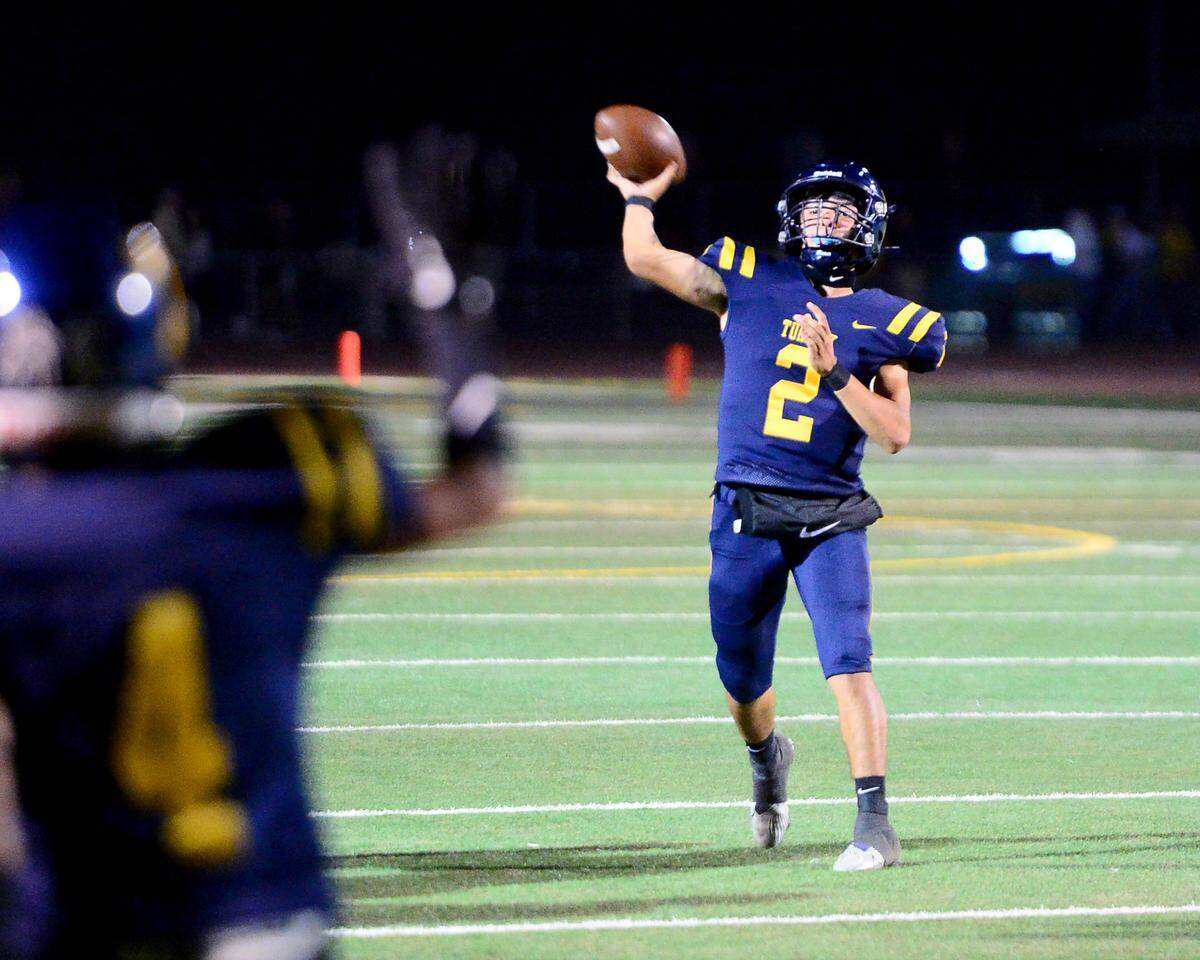 Turlock quarterback Vincent Gonzales (2) throws a pass to the endzone during a CIF Sac-Joaquin Section Football Division I playoff game between Turlock High School and Sheldon High School at Turlock High School in Turlock, California on Nov. 3, 2023.