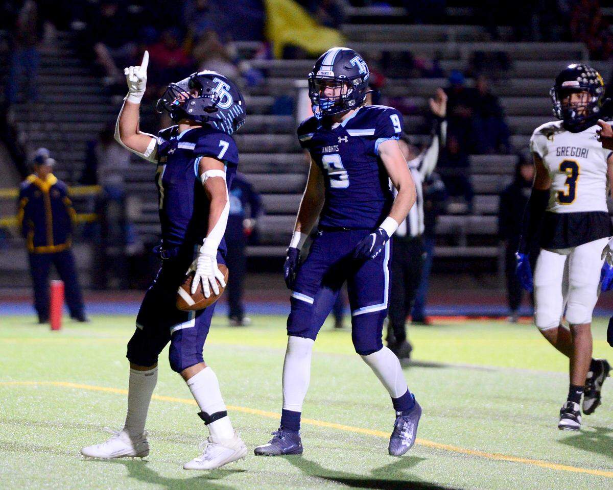 Downey running back Elijah Tamayo (7) celebrates a touchdown during a game between Downey and Gregori at Downey High School in Modesto, California on October 27, 2023.