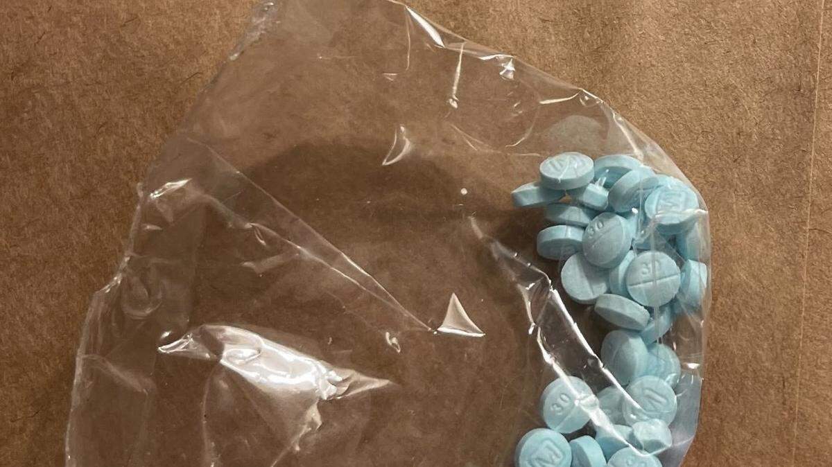 Suspected fentanyl pills recovered during a search of rooms at a hotel in December, according to the Sonora Police Department.