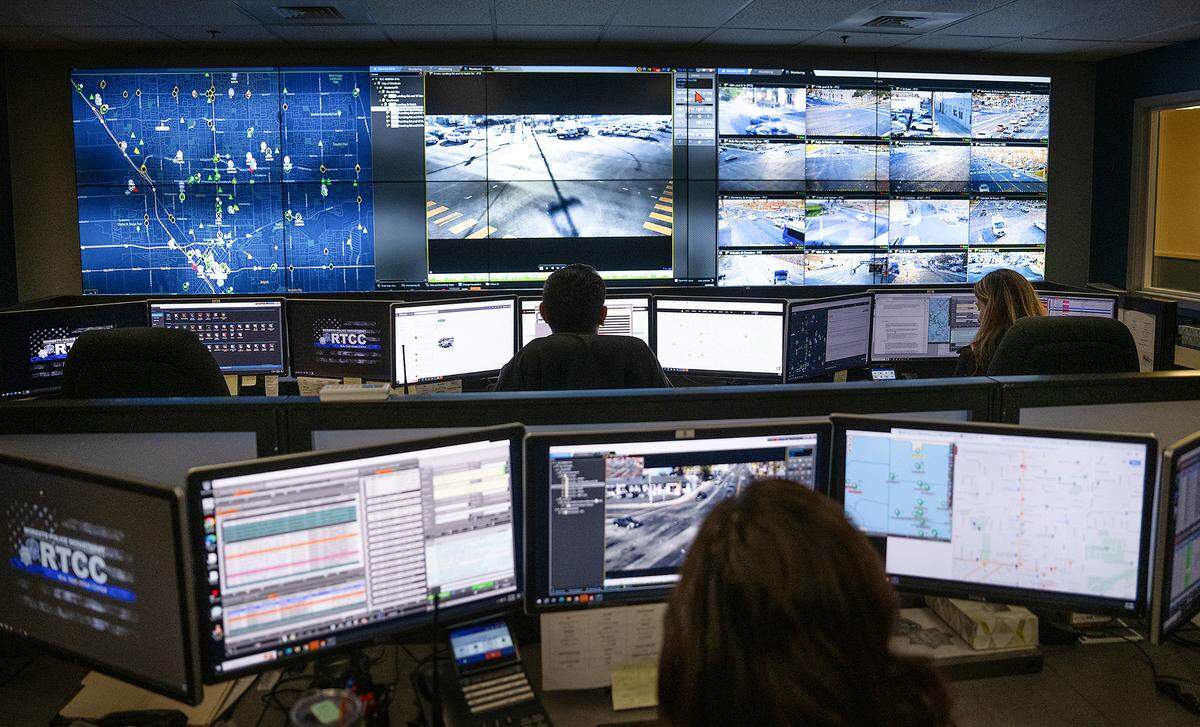 Police technicians monitor police cameras at the Real Time Crime Center inside the Modesto Police Department in Modesto, Thursday, Jan. 30, 2025.