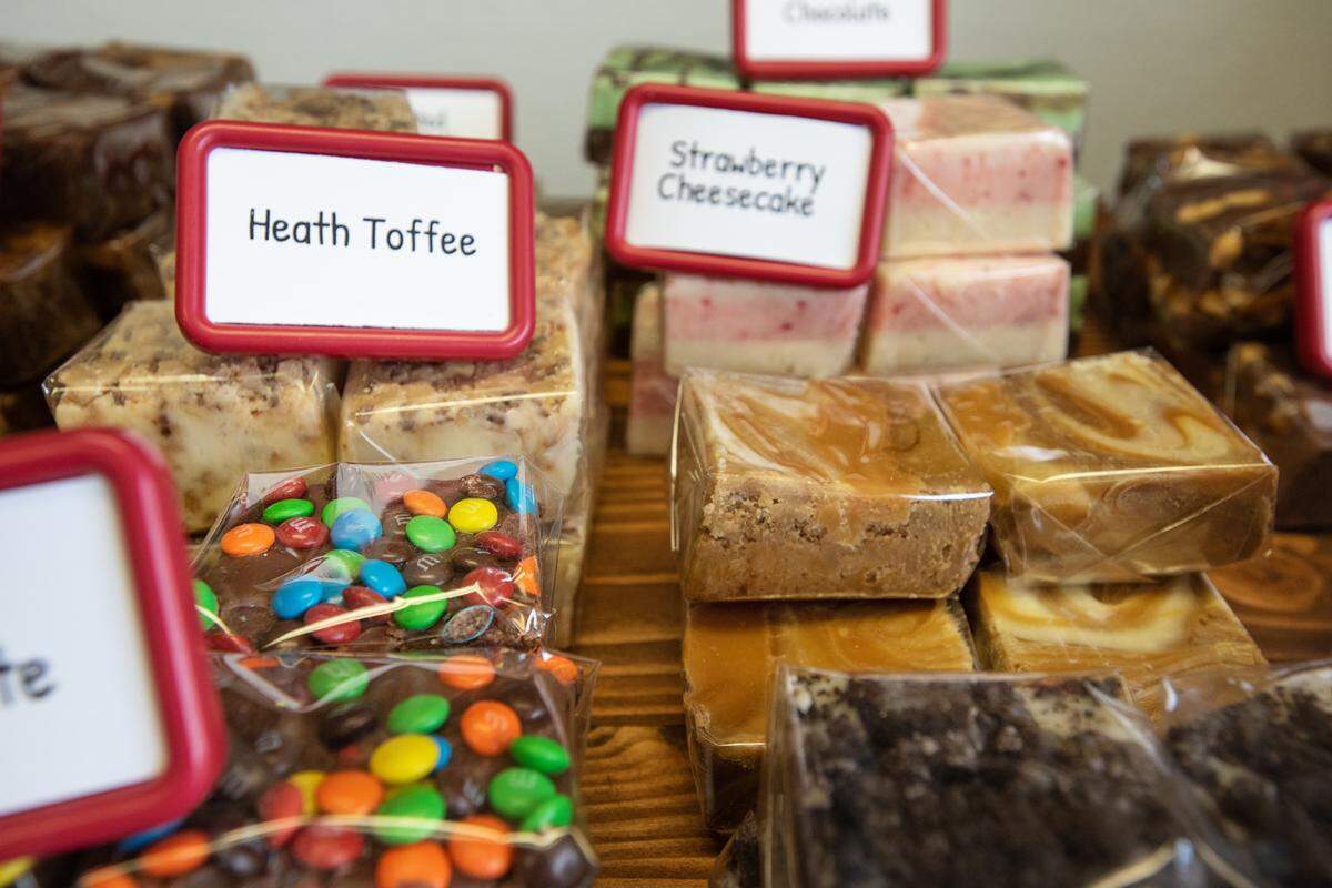 Owner Rhonda Vargas packages different varieties of fudge at Fudge-It confections in Ceres, Calif., on Tuesday Sept. 15, 2020.