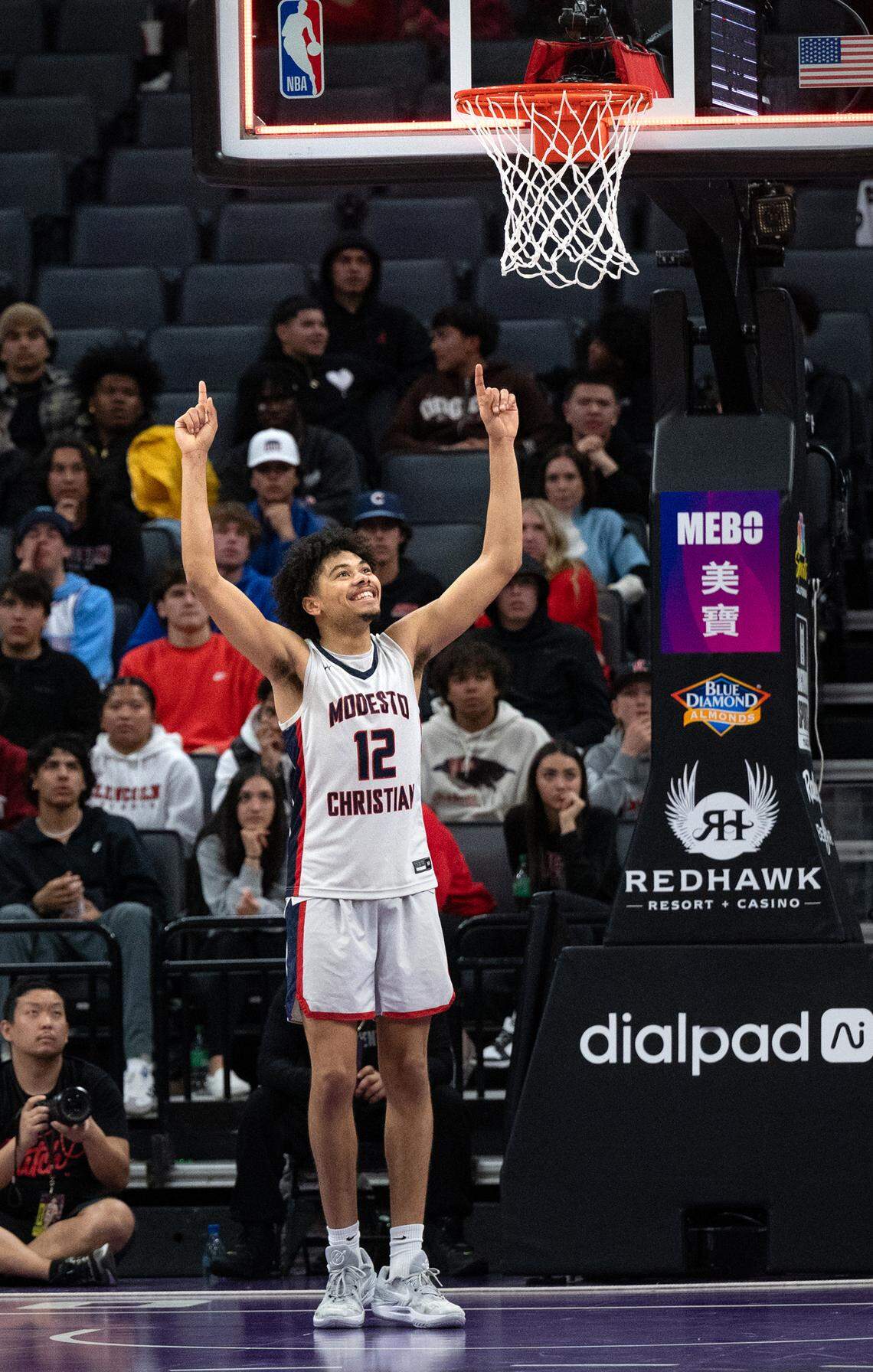 Modesto Christian’s Marcus Washington watches the scoreboard as time expires and seals the 68-63 victory over Lincoln of Stockton in the Sac-Joaquin Section Division I championship game at the the Golden 1 Center in Sacramento, Calif., Wednesday, Feb. 21, 2024.