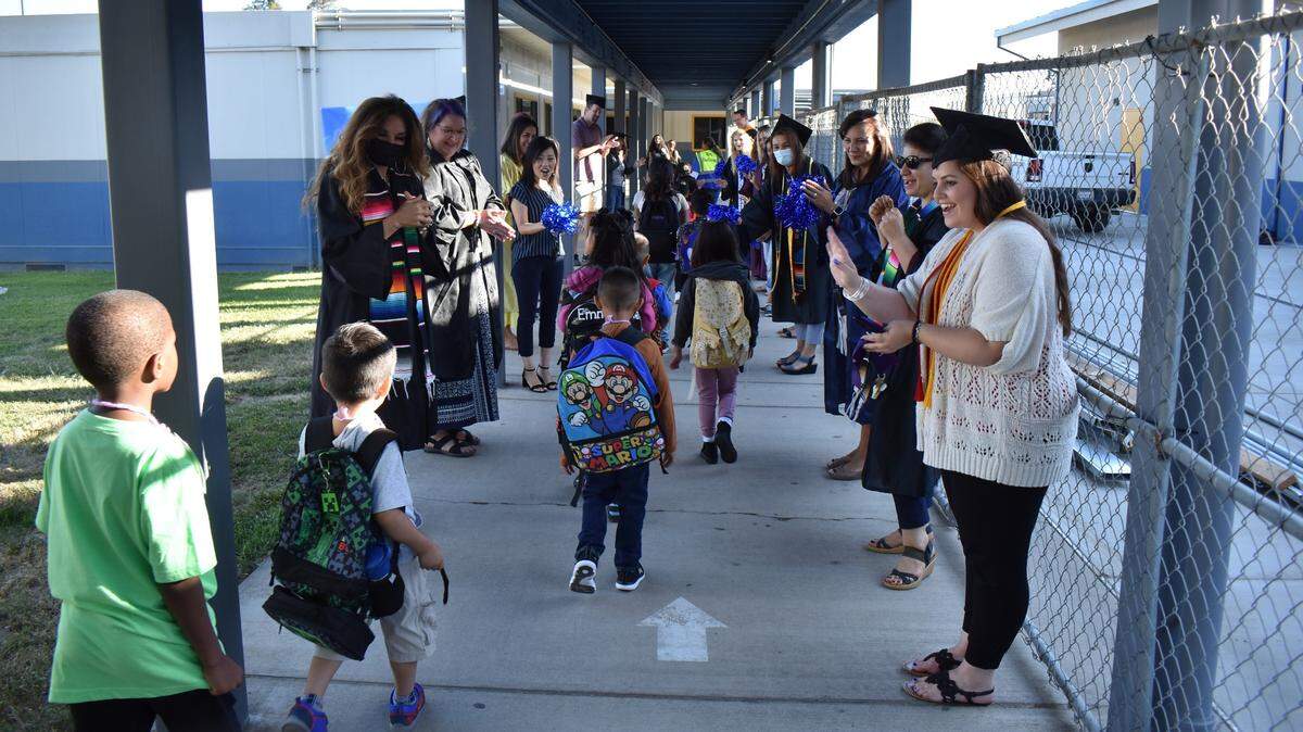Children at Fairview Elementary are welcomed on the first day of school for Modesto City Schools, Monday, Aug. 8, 2022.