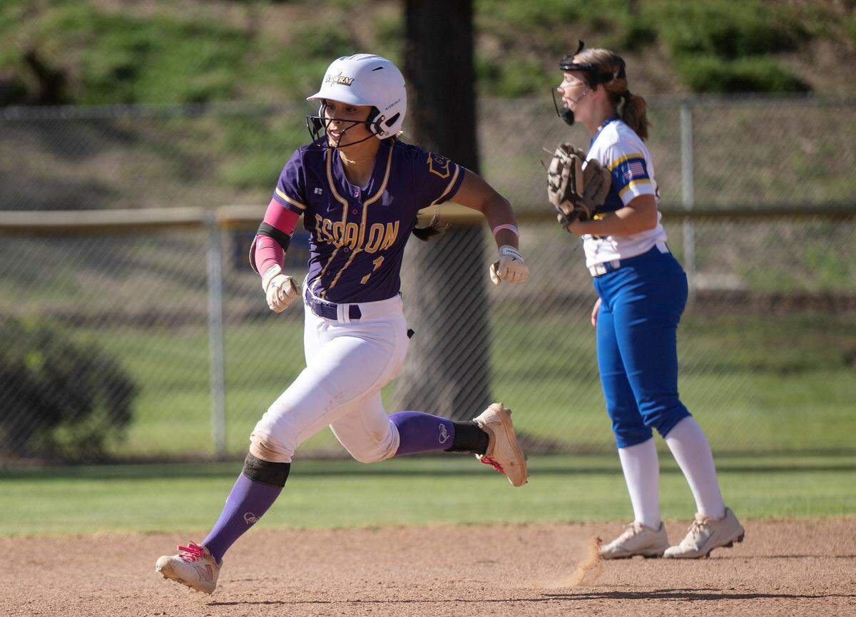 Escalon’s Madi Babasa legs out a triple during the Trans Valley League game with  Ripon Christian in Ripon on April 16, 2026.