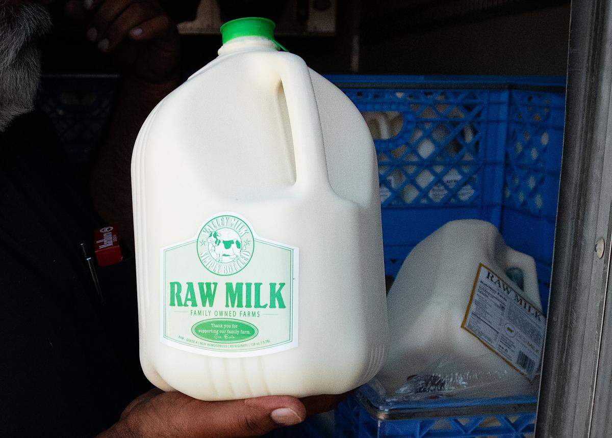 Modesto dairy owner Joe Bento holds a gallon of the Valley Milk Simply Bottled raw milk that was recalled in September 2021 due to bacteria called Campylobacter jejuni. The same farm had a recall due to the bird flu virus, announced Dec. 14, 2024.