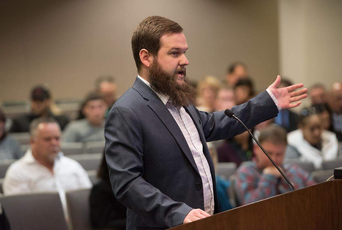 Aaron Boshart represents Modesto Cannabis Company as he makes a comment to the city council during a special Modesto City Council meeting on cannabis dispensary permitting at Tenth Street Place in Modesto, Calif., Wednesday, Dec. 19, 2018.