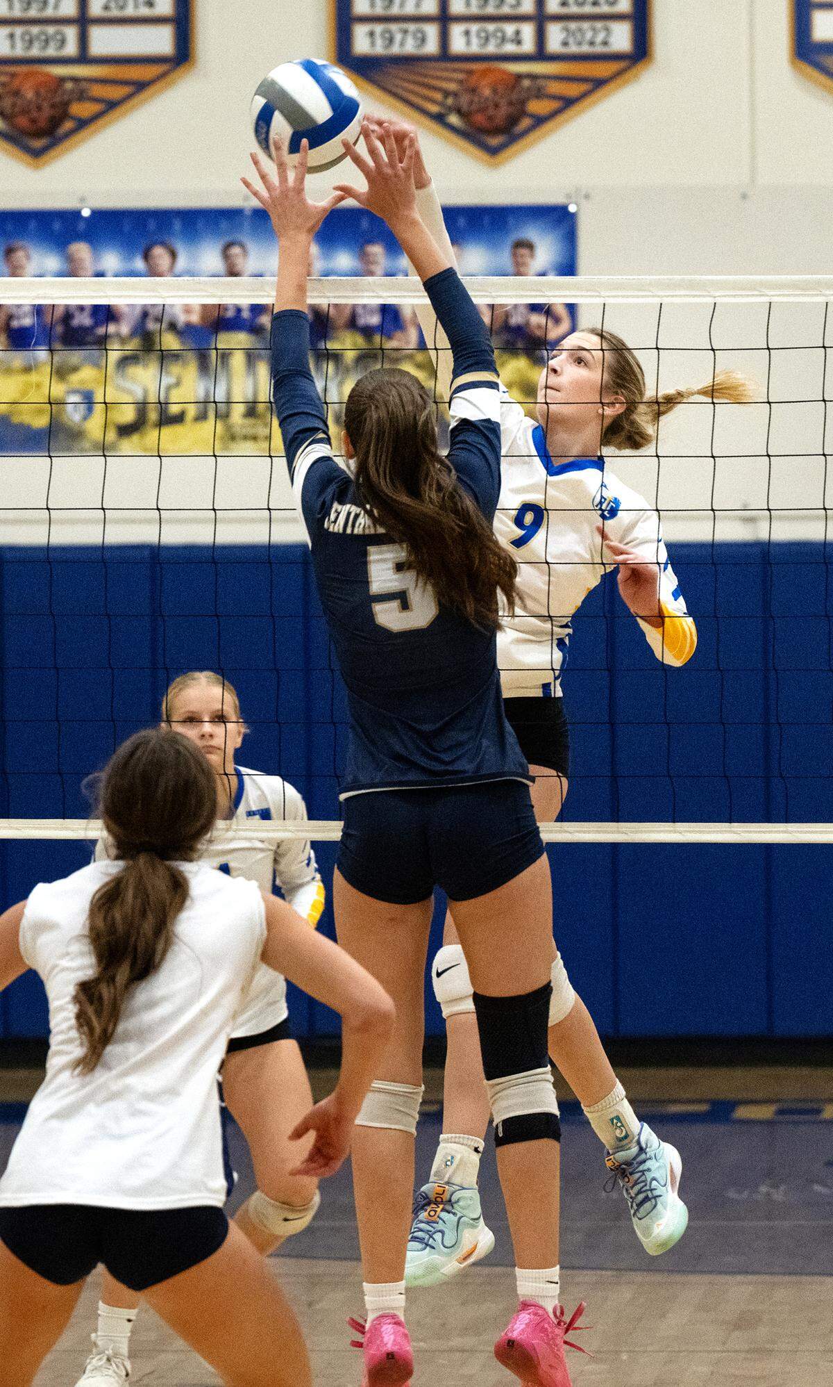 Ripon Christian’s Brynn Bohn flips the ball past Central Catholic defender Alyssa Thomas during the Sac-Joaquin Section Division III quarterfinal playoff match at Ripon Christian High School in Ripon, Thursday, Oct. 31, 2024. Ripon Christian won the match 3-2.