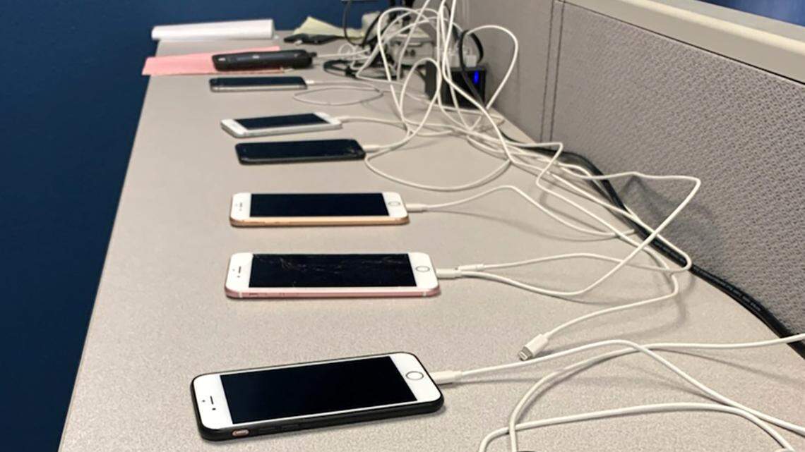 This photo shows the Modesto Police Department using software tools to unlock Apple phones connected to crimes. The department wants to use similar tools to unlock more Android phones.