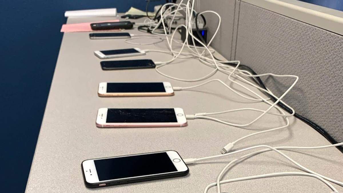 This photo shows the Modesto Police Department using software tools to unlock Apple phones connected to crimes. The department wants to use similar tools to unlock more Android phones.