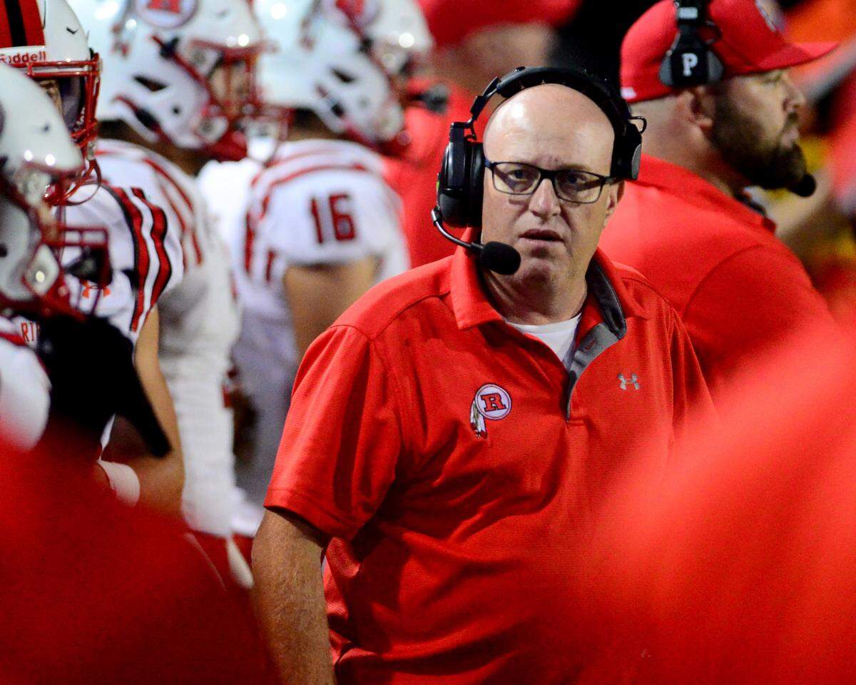 Ripon Head Coach Chris Musseman looks down his sidelines during a game between Escalon High School and Ripon High School in Escalon, California on October 20, 2023. 