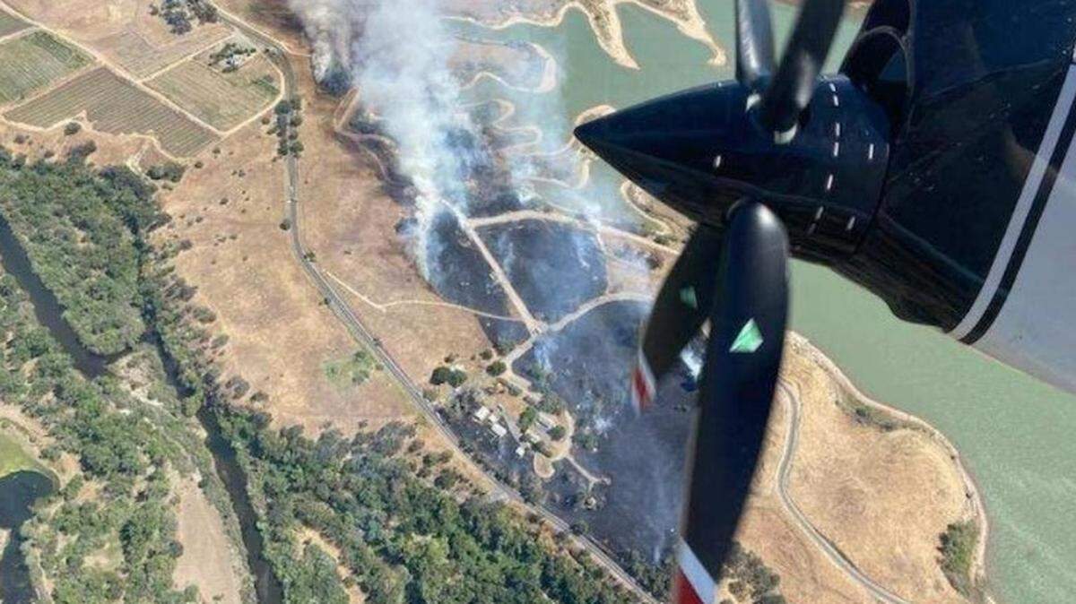 A fire at the Turlock Lake State Recreation Area on Wednesday, May 11, 2022, burned 55 acres and buildings and injured a firefighter, officials report.