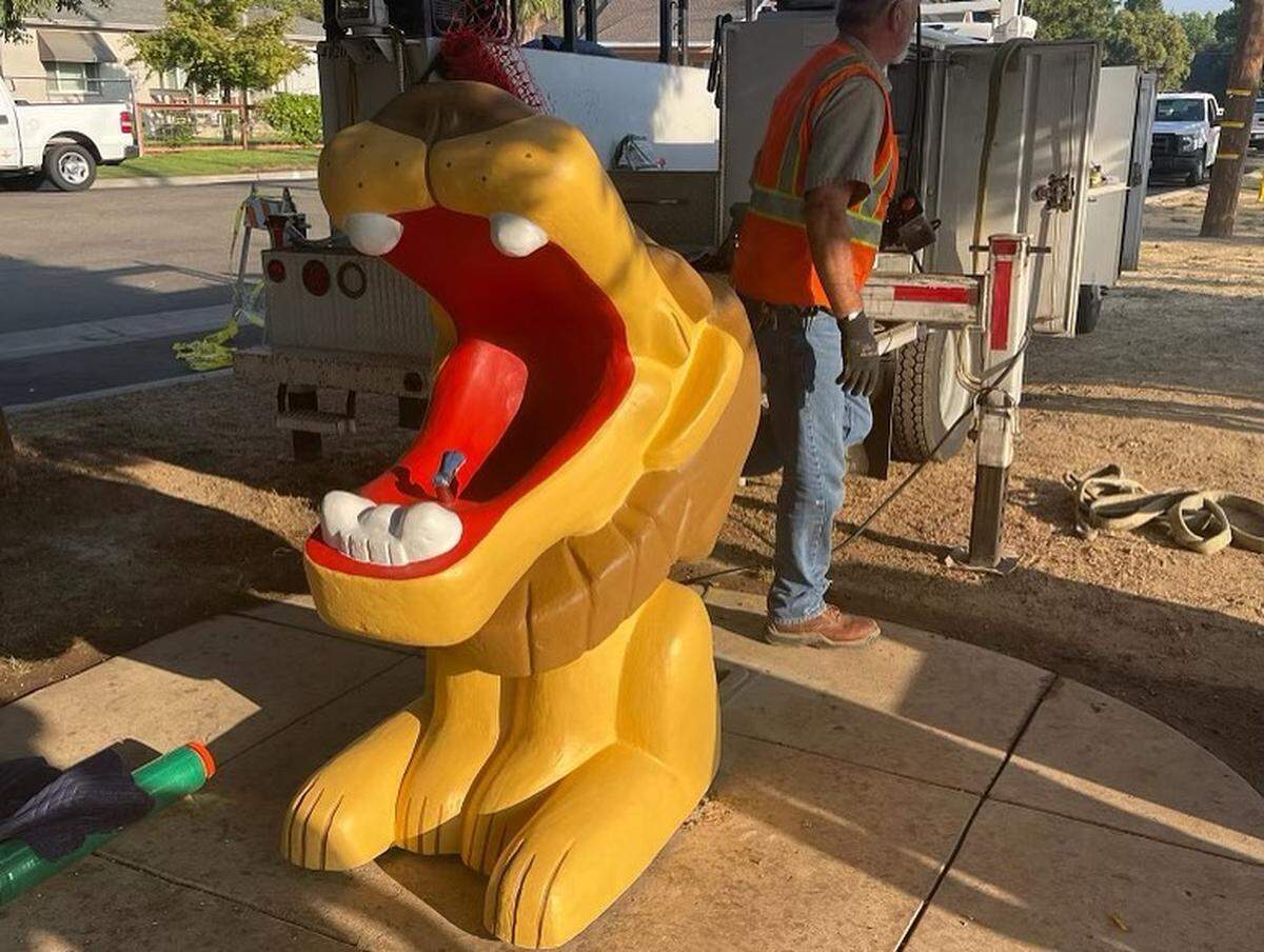 The Leo the lion water fountain that had sat in Beard Brook Park since 1960 is relocated to the Virginia Corridor Trail after being restored.