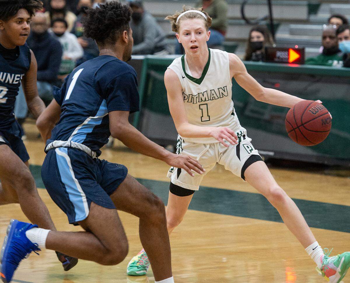 Pitman’s Avery Sanchez advances the ball during the Central California Athletic League game with Downey at Pitman High School in Turlock, Calif., on Friday, Feb. 4, 2022.