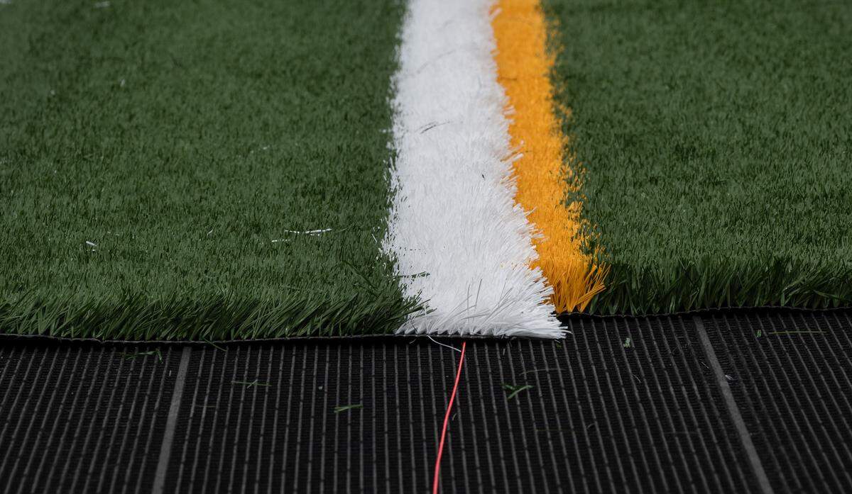 New artificial turf is being installed at Lanphear Stadium at Gregori High School in Salida, Calif., on Friday, August 5, 2022.