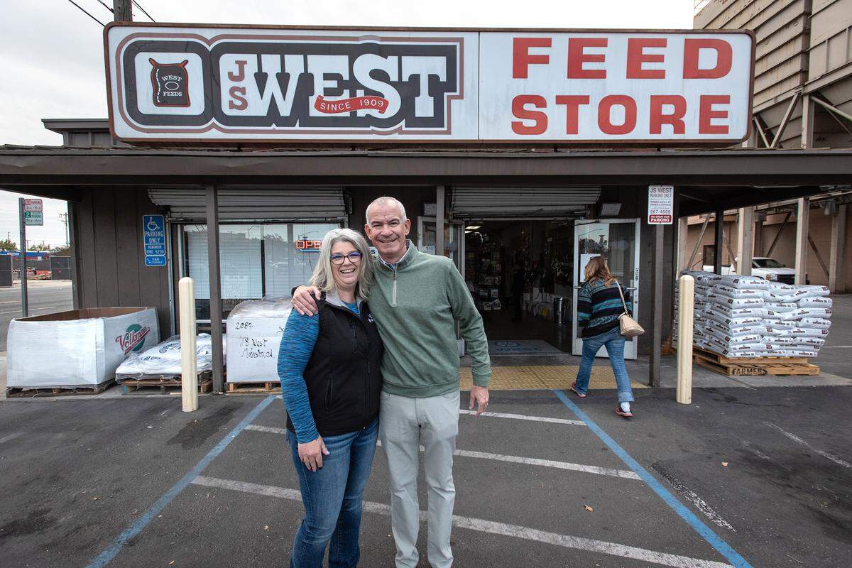 J.S. West President and CEO Mike West and store manager Heather Rose at the J.S. West feed store on 9th Street in Modesto, Calif., Monday, Nov. 1, 2022. The store, which opened in 1958, is closing on Nov. 11.