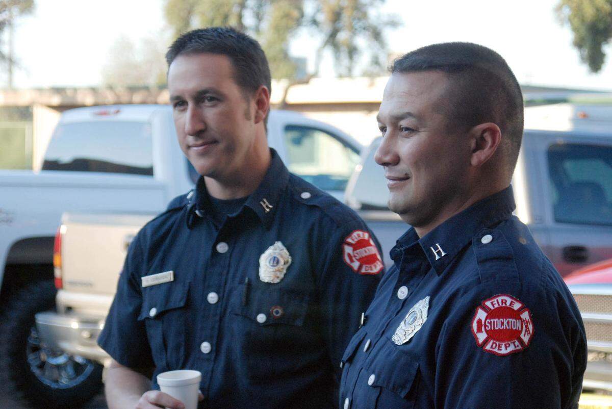 In this undated photo posted on the website of Fund the First, Max Fortuna, right, is pictured with Stockton Fire Department Chief Richard J. “Rick” Edwards.