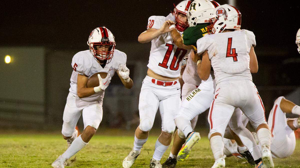 Xzavier Clark, 5, of Ripon High works his way around the line on his way up field. Ripon vs Hilmar at Hilmar Sept. 23, 2022.