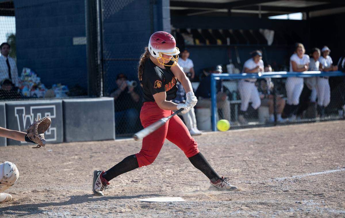 Oakdale’s Presley Barnes connects for a base hit during the Valley Oak League game with Central Catholic at Central Catholic High School in Modesto, Calif., on Tuesday, May 10, 2022. Central Catholic won the game 2-1.