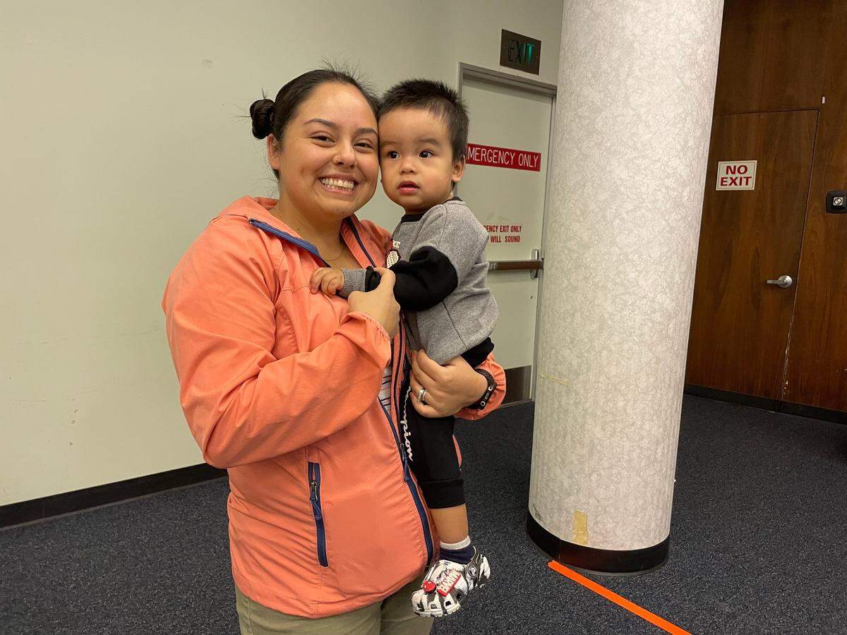 “It’s kind of hard finding Spanish resources. The ones we’ve gotten, well it’s kind of hard not to be repetitive,” said Mariana Fontanilla, holding her son, Miles. January 26, 2023