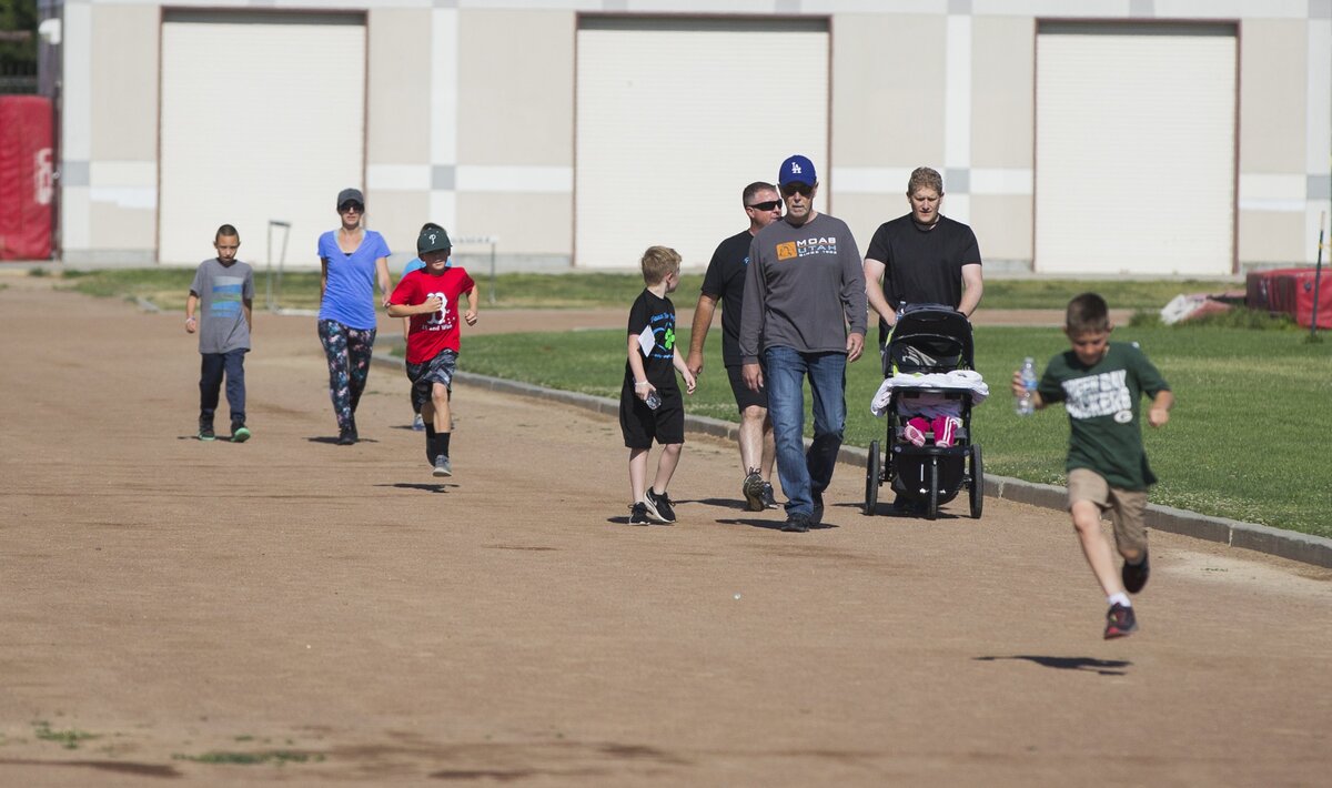 A large group of friends and family gathered to help Ellie Hart of Turlock, CA spearheaded a walkathon to raise money to get a service dog for Peyton Bruce, a 10-year-old with Type 1 diabetes Sunday May 13, 2018 morning at Pitman High School
