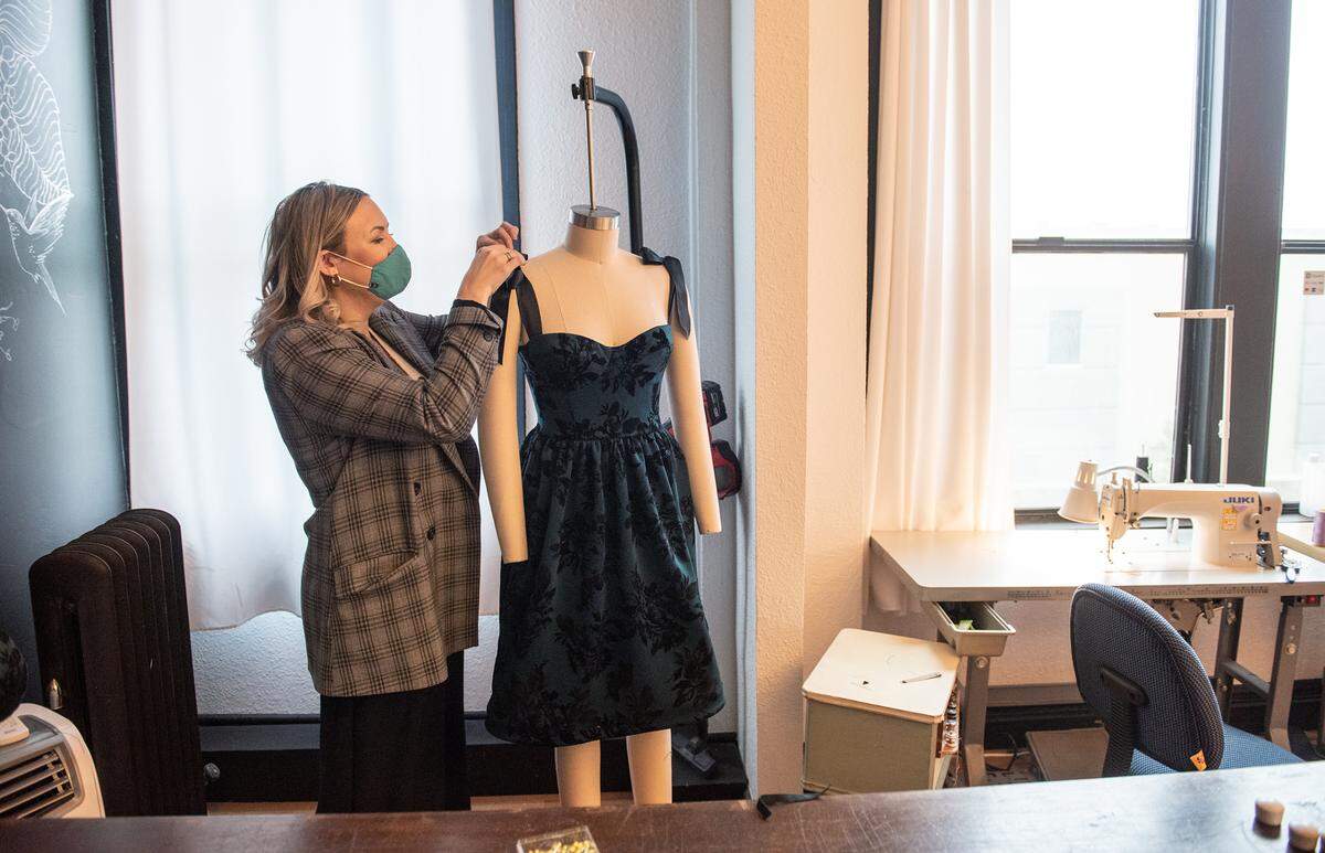 Designer Stephanie Oyervides in her workspace above the The Taste Studio boutique on J Street in Modesto, Calif., on Wednesday, Dec. 29, 2021.