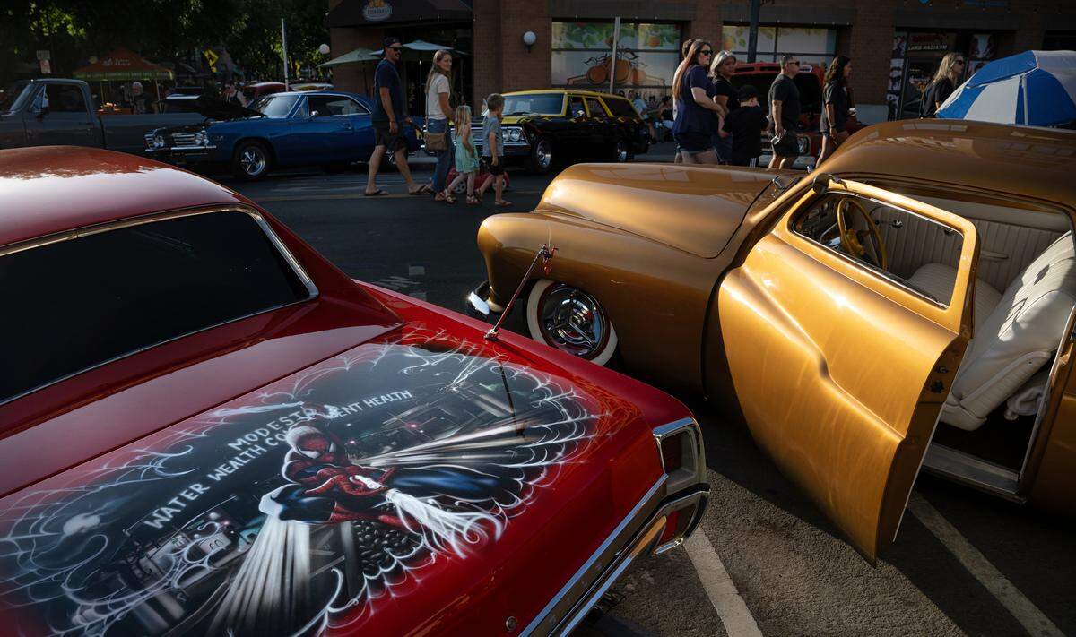 Classic cars line the streets of downtown Modesto during the Legends of the Cruise Park N’ Shine Wednesday, June 4, 2025. 