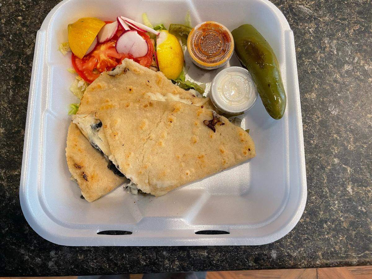 Huitlacoche quesadillas, a regional delicacy rarely found outside of Mexico, are served on a handmade corn tortilla at Tacos El Jalapeno food truck on Paradise Road in Modesto.