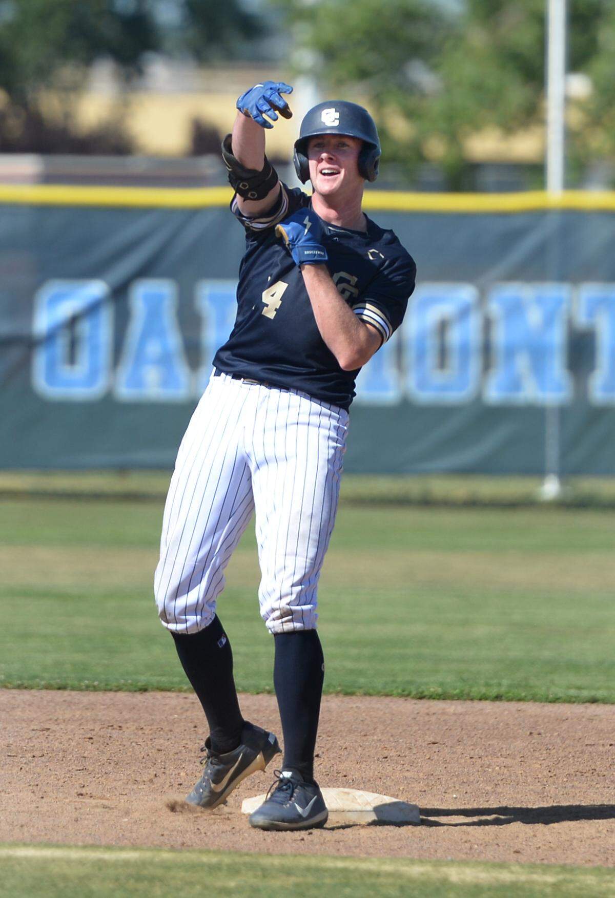 Central Catholic’s Wesley Payne celebrates a double against Oakmont High in the CIF Northern California Division III Regional Championship in Roseville, Calif. on Saturday, June 1, 2024.