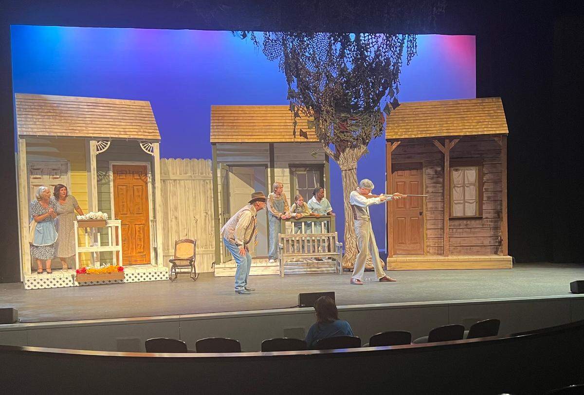 Players in ‘To Kill a Mockingbird’ have a recent dress rehearsal. Young actors Camden Van Lewen, 14, and Daisy Brailey, 10, stand in the center back.