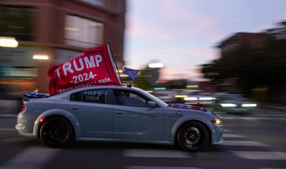 Trump supporters drive through downtown Modesto, Tuesday, Nov. 5, 2024.