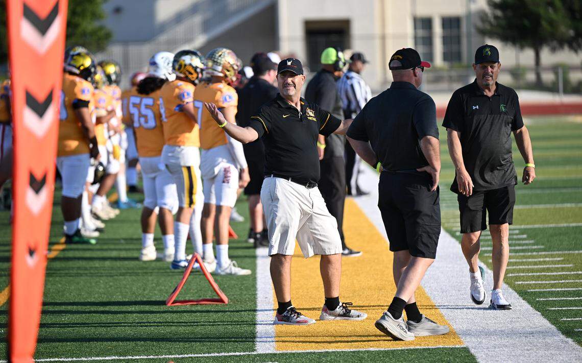 South co-head coach Trent Merzon (Oakdale), middle, during the Central California Lions All-Star Football Game at Tracy High School in Tracy, Calif., Saturday, June 24, 2023.