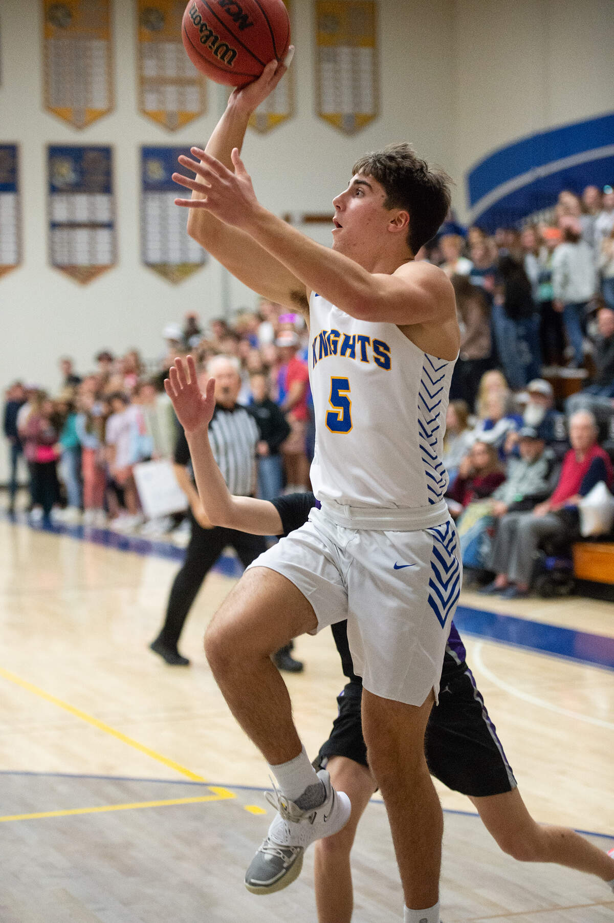 Ripon Christian’s Trey Fasani scores a basket during the Trans Valley League game with Escalon at Ripon Christian High School in Ripon, Calif., on Friday, Jan. 7, 2022. Ripon Christian won the game 61-53.