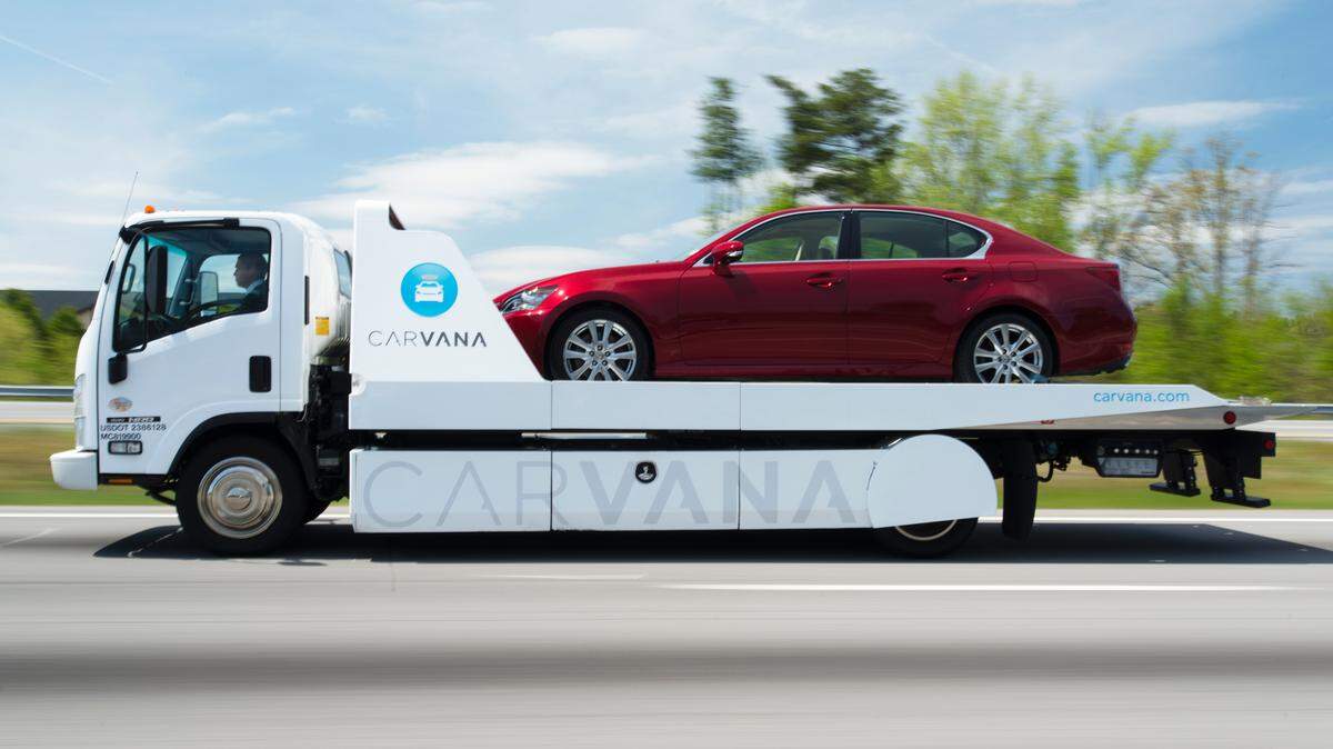 A car is shipped to its seller using Carvana, an online used car service.