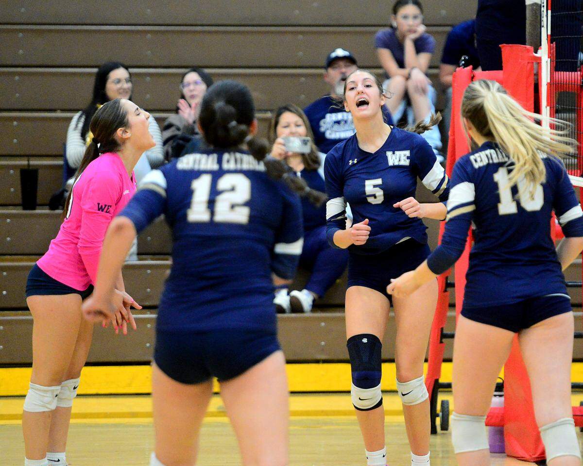 Central Catholic’s Alyssa Thomas (5) celebrates with her teammates after scoring a point during a game between Oakdale and Central Catholic at Oakdale High School in Oakdale, Calif. on Thursday, Oct. 17, 2024.&nbsp;